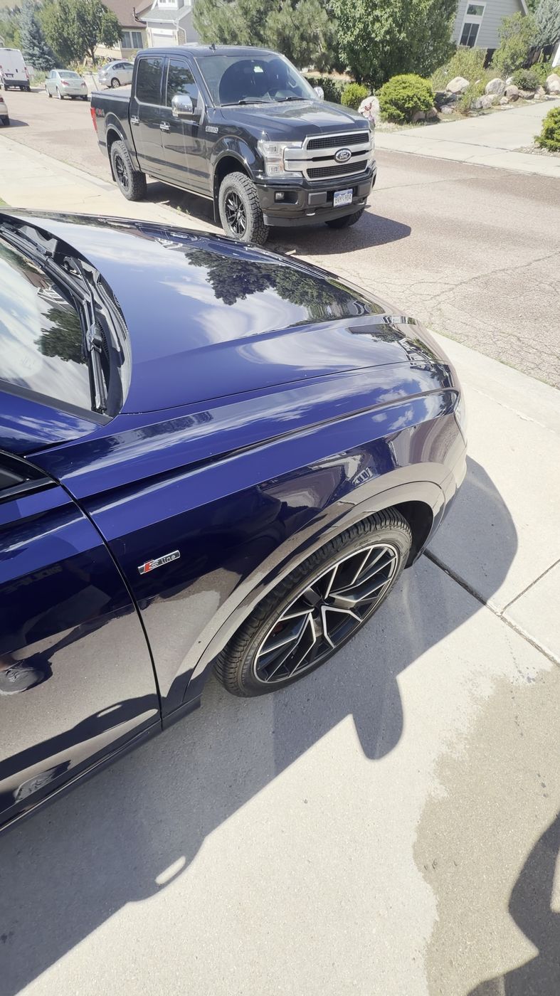 Glossy white BMW M4 after detail
